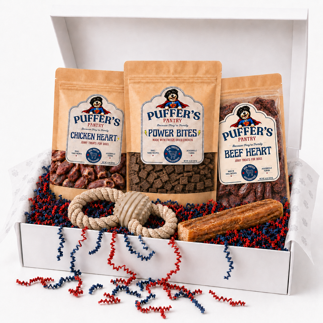 Puffer's Pantry products, custom toy, and chew in a white subscription box